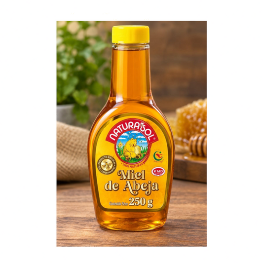 Miel de abeja Naturasol de 250 g marca Shefa en envase transparente con tapa amarilla sobre mesa de madera